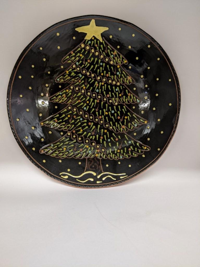 Breininger Christmas Tree Charger: Lester Breininger redware charger with Christmas tree and snow done in slip decoration, line of sgraffito around rim, 14"D, signed 2005