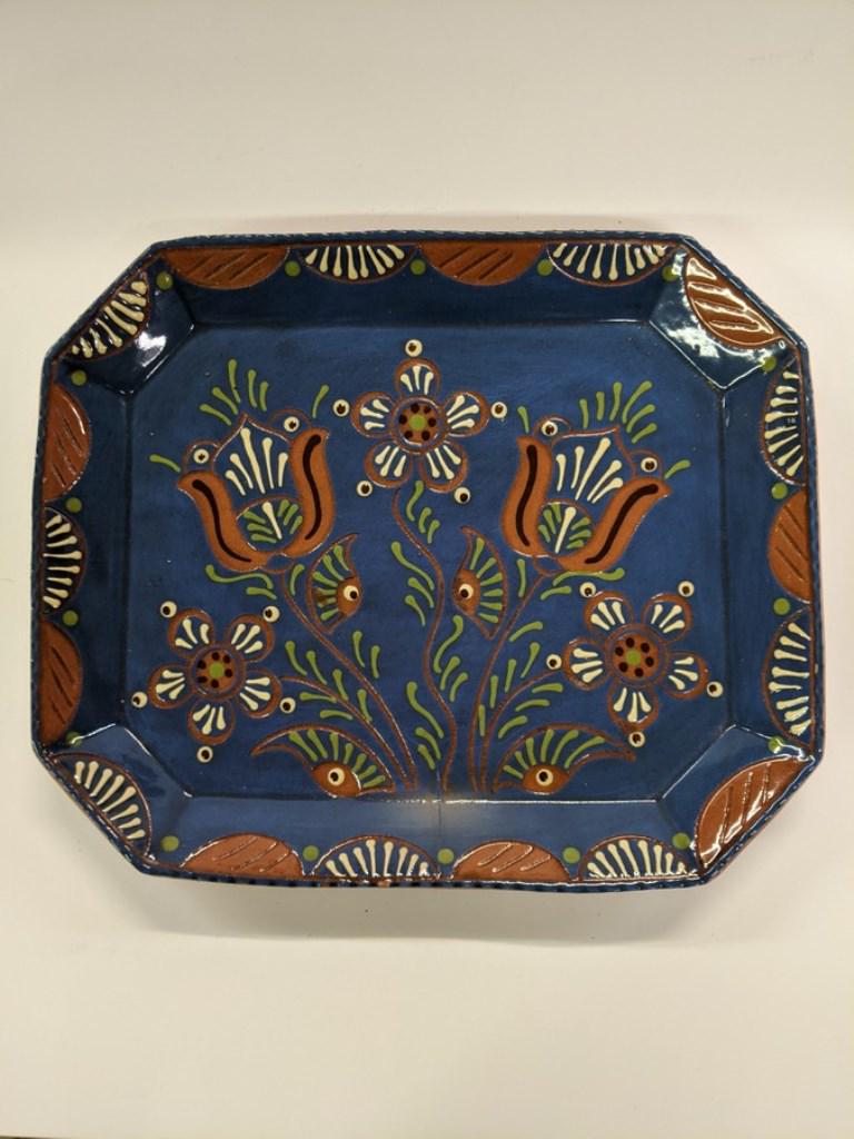 Lester Breininger Tulip Tray: Lester Breininger redware rectangular tray with clipped corners, center field with tulips surrounded by a colorful border, slip and sgraffito decoration, 10" by 12"