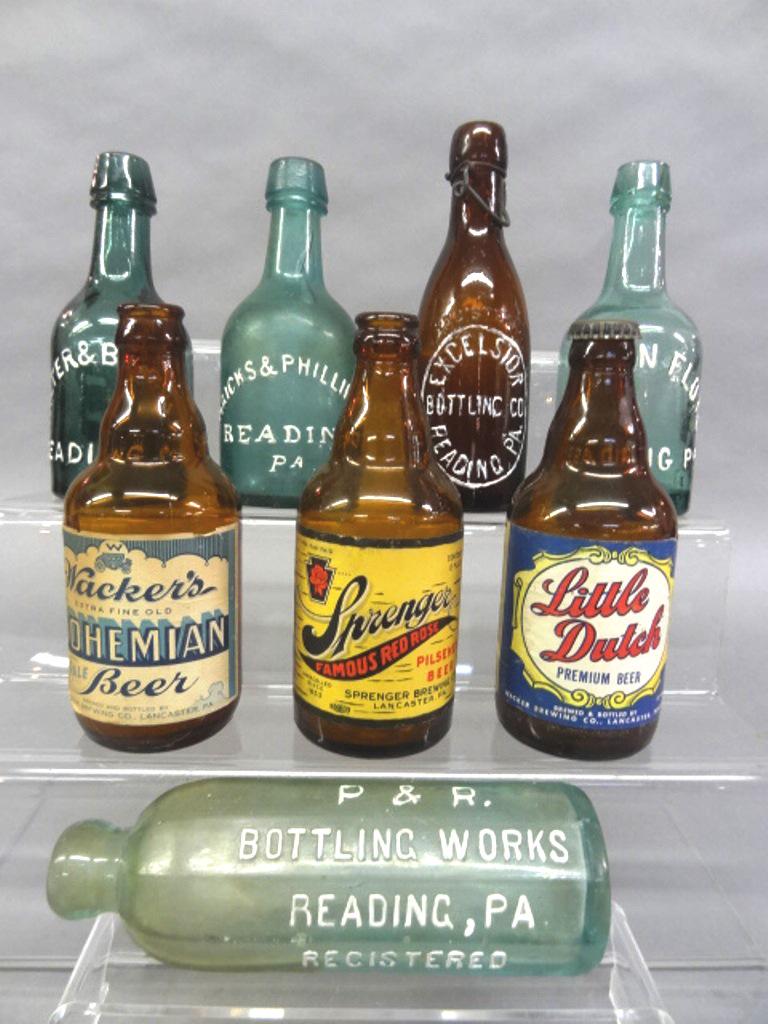 Reading Pa. Squat Beer Bottles & Others: Three antique Reading Pa. squat beer bottles, Walter & Brother, Herman Floto and Maicks & Phillipson 7"H, also includes a Excelsior Bottling Co with applied lip 7.5"H, a P.&R. Bottling Works ten sided