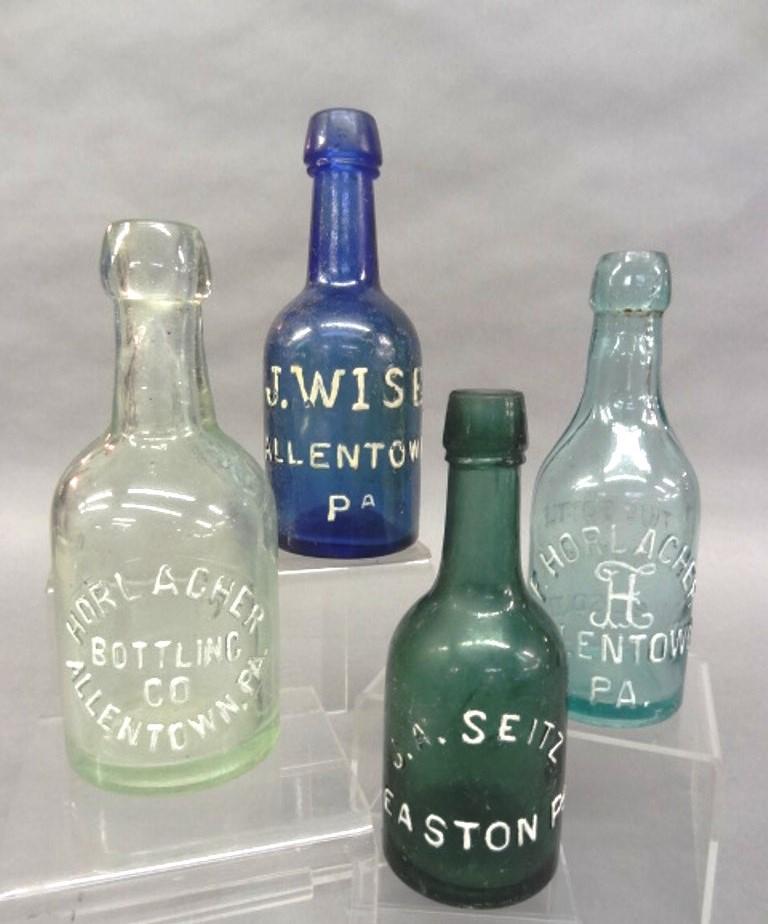 Allentown & Easton Squat Beer Bottles: Three early squat beer bottles, blue J. Wise Allentown Pa. with small frits on blob top 7"H, Horlacher Bottling Co. Allentown and J.A. Seitz Easton Pa., also includes a F. Horlacher Allentown bottle 7