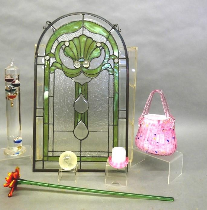 Tiffany Globe, Stained Glass Panel & Art Glass: Tiffany & Co signed clear and frost globe made in Austria 2.25"D, stained glass panel with hanging chain 13.5" by 23" has one crack, artisan hand blown case glass basket 9.5"H, pink glass hat 2"H, Gal