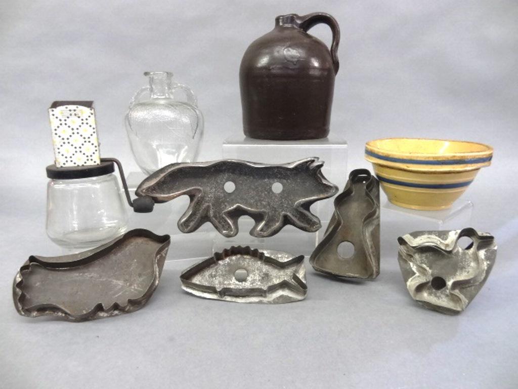 Vintage Cookie Cutters, Apple Bottle, Jug & Grinder: Vintage dog cookie cutter signed K Dunwoody 9.5"L, bird with handle, duck with handle and fish, brown glazed jug with minor chipping on rim 6"H, Androck kitchen spice grinder, vintage White House appl