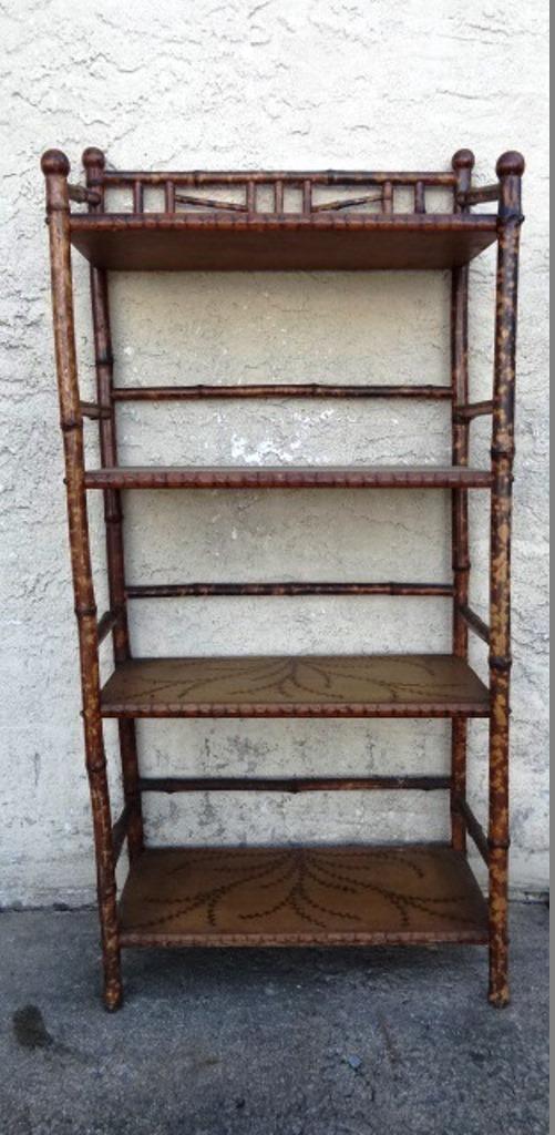 Antique Victorian Bamboo Bookcase: Antique bamboo stick and ball style four shelf bookcase with stenciled ivy on top and edges of shelves, 20.5"W, 44"H, 9.5"D