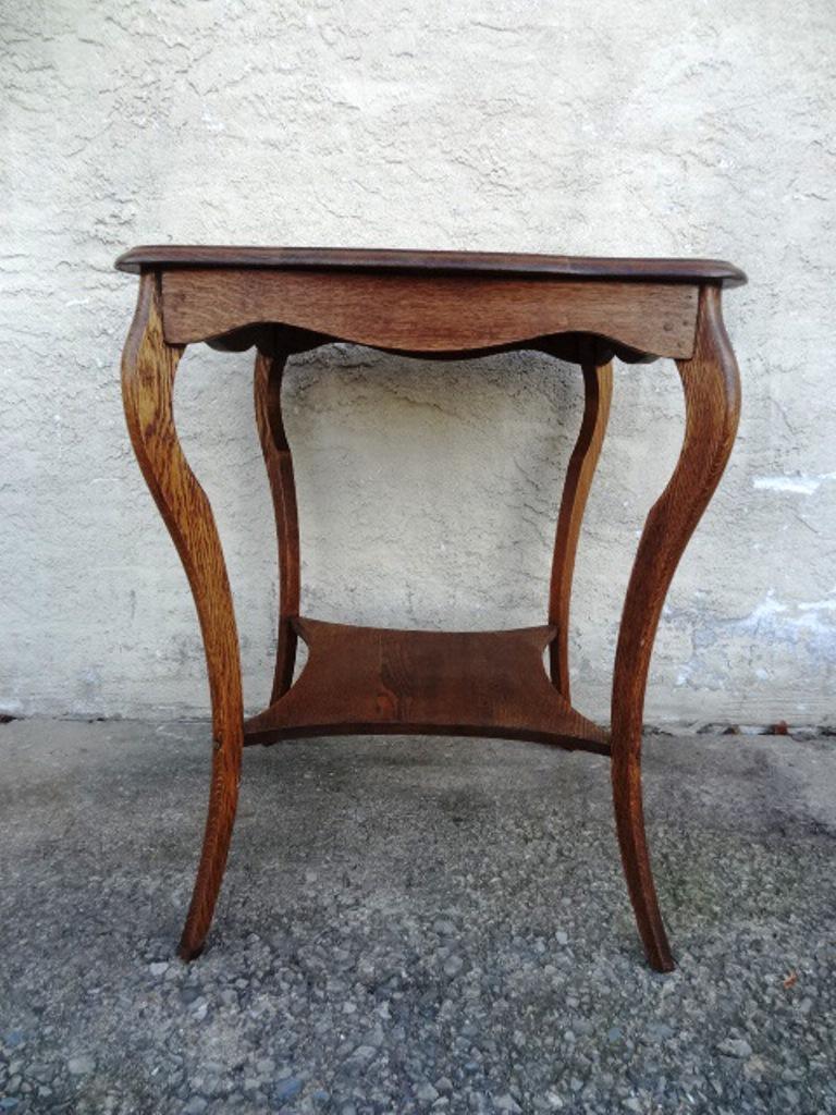 Antique Oak Side Table: Antique oak side table with scalloped rectangular top, cabriole legs with lower shelf, 24" square, 30"H