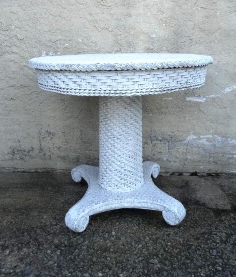 Antique White Wicker Round Table: Antique wicker table with late neo-classical style base, 28.5"D, 27.5"H