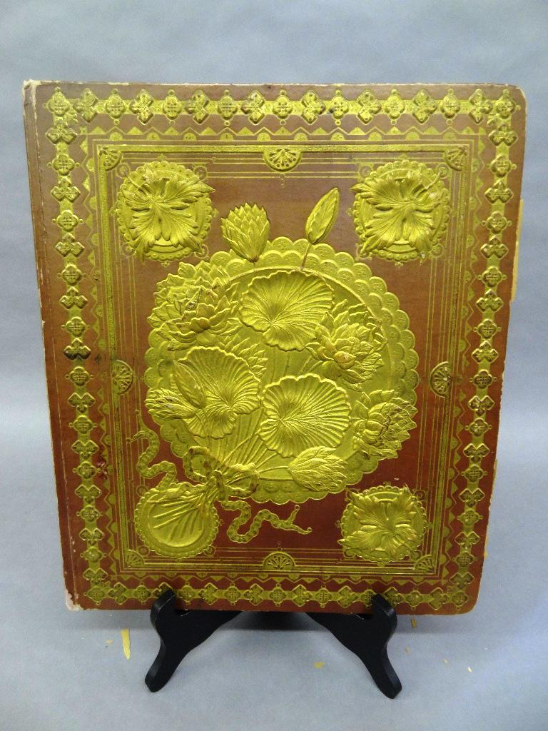 Victorian Scrap Album: Antique late 1800's Victorian scrap album, ornate cover with embossed flowers, contains 34 pages of trade cards, post cards, die-cuts and cut-outs