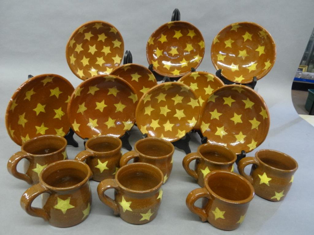 Red Oak Pottery Redware Mugs & Bowls: Contemporary slip decorated redware pottery by Pam Armbrust of Red Oaks Pottery of Easton Pa., included eight mugs average height 3.5", nine bowl average diameter 7"