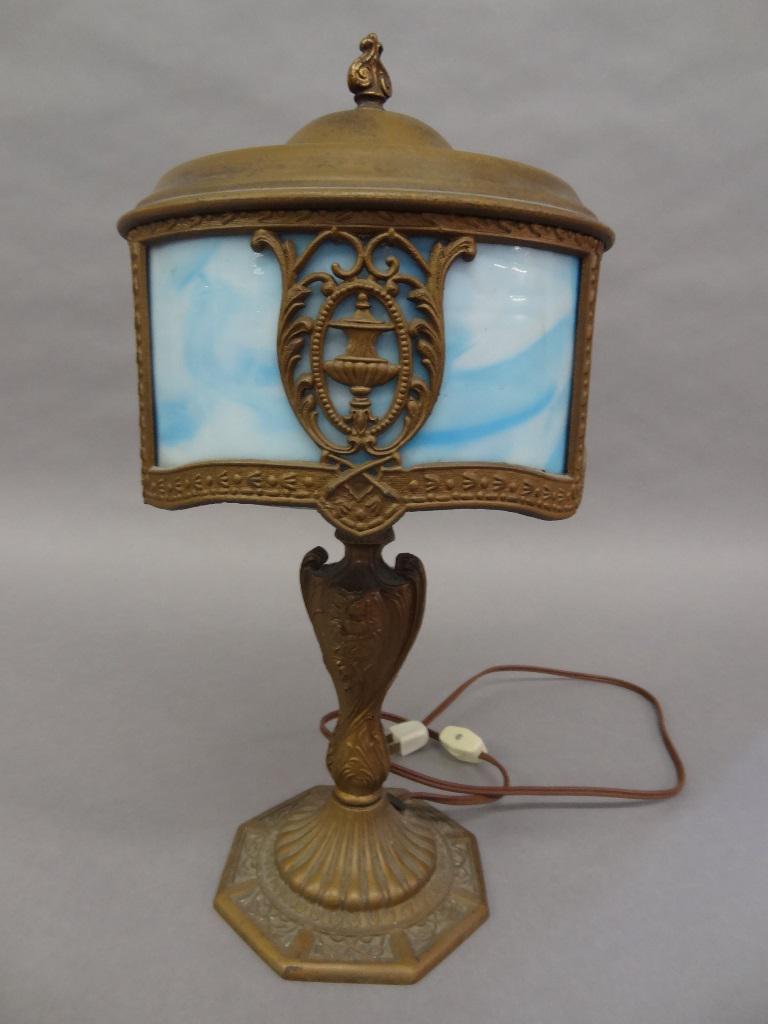 Art Deco Slag Glass Table Lamp: Vintage Art Deco table lamp, painted iron base with single socket marked on bottom S1579, round soft metal shade 8.5"D with scroll and urn decoration around slag glass panels and a painted tin top, 14