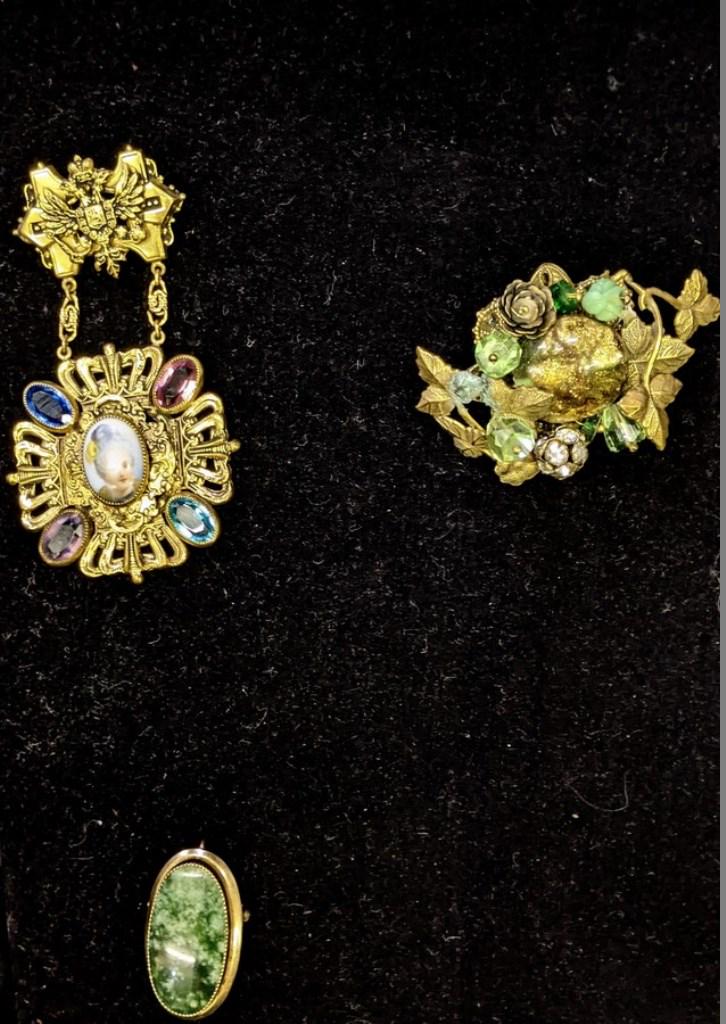 Victorian Portrait Pin With Stones & Others: Victorian gold gilt portrait pin with four colored stones 3.25"H, Catamore green agate pin with 1/20 12KT gold filled mount 1 3/8"H, Victorian floral pin with glass beads and rhinestones 2.25"W