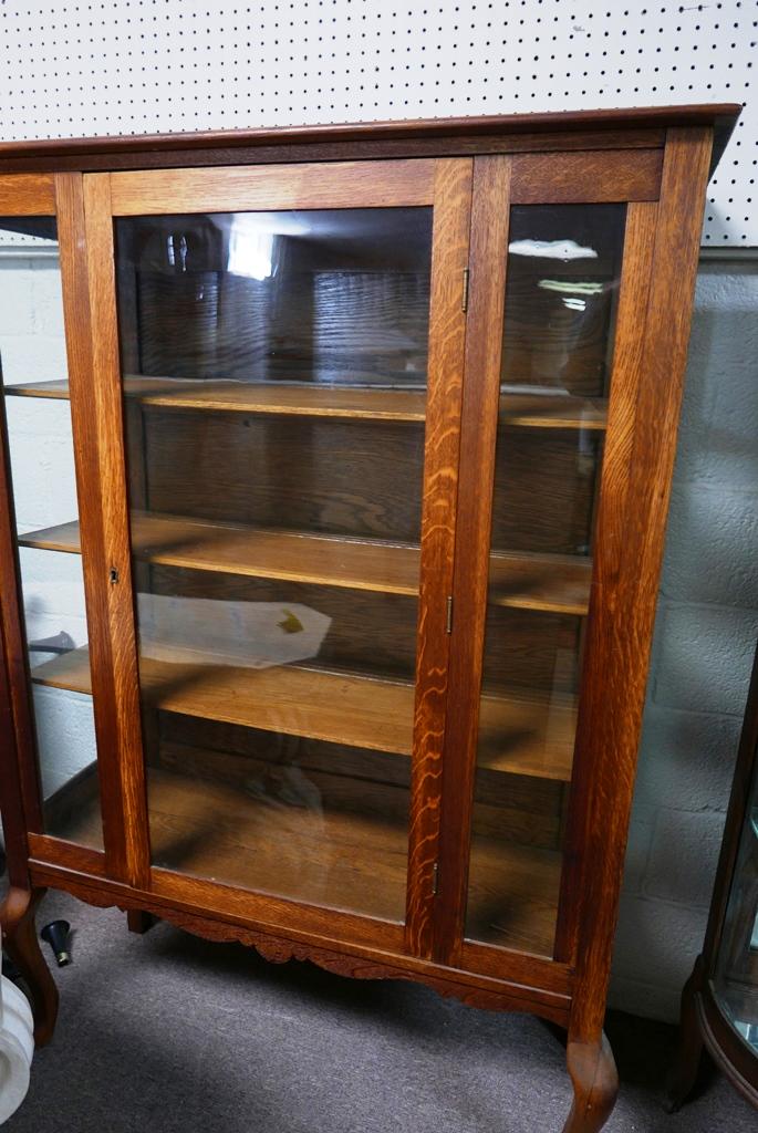 Antique Oak China Cabinet: Antique early 20th century oak china cabinet with cabriole legs and scalloped skirt, three interior shelves with plate grooves, 42.5"W, 62"H, 16"D