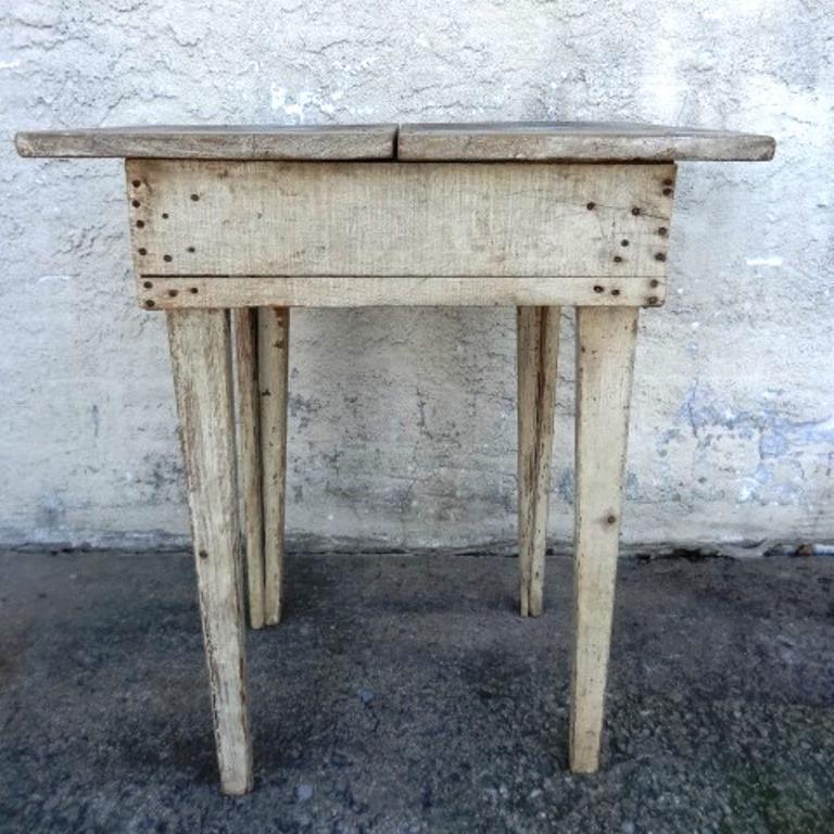 Primitive Country Table: Primitive country table with painted base and legs, checkerboard style painted top, 23"W, 16"D, 27"H