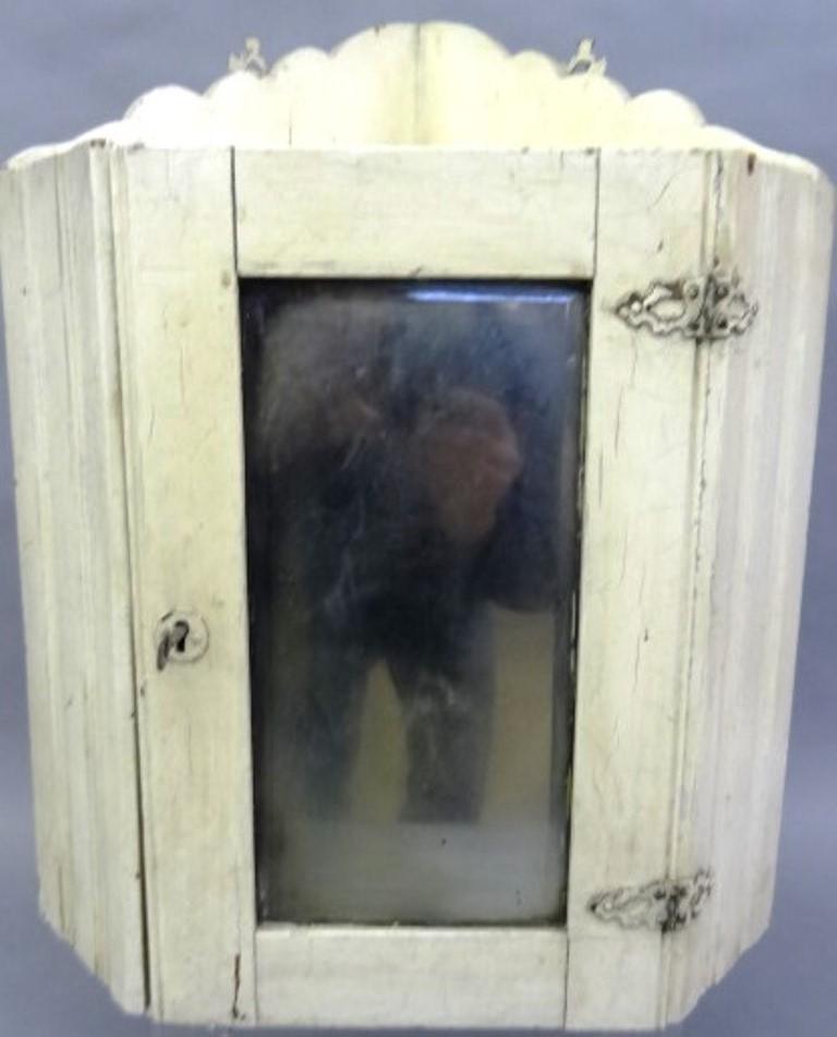 Antique Small Painted Hanging Corner Cabinet: Antique early 1900's small painted hanging corner cabinet with mirrored door, original hardware, 16"W, 20.5"H, 11"D