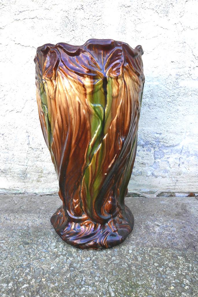 Large Art Nouveau Jardiniere or Umbrella Stand: Large early 20th century Art Nouveau jardiniere or umbrella stand with a scalloped lip and flowing flowers, 12"D, 21"H, unsigned