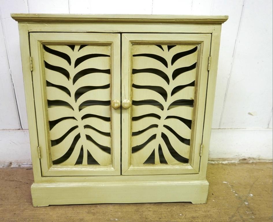 Small Painted Cabinet: Newer small painted wood cabinet, two doors with cut-outs cover a single shelf, 22"W, 8.75"D, 22.5"H