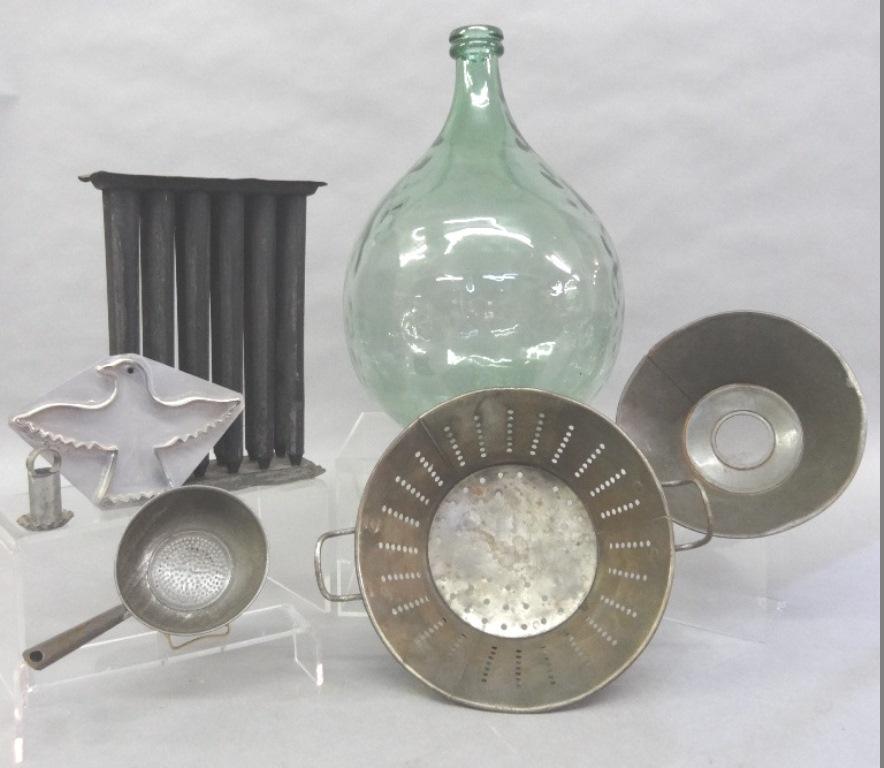 Early Kitchen Tin Accessories & Demijohn: 19th century 12 candle mold with one small rust hole and minor bends on edges 10.5"H, colander 9.5"D, straining bowl 8.25"D, straining ladle with handle 7"L, baking stamp, newer bird cookie cutter, gr