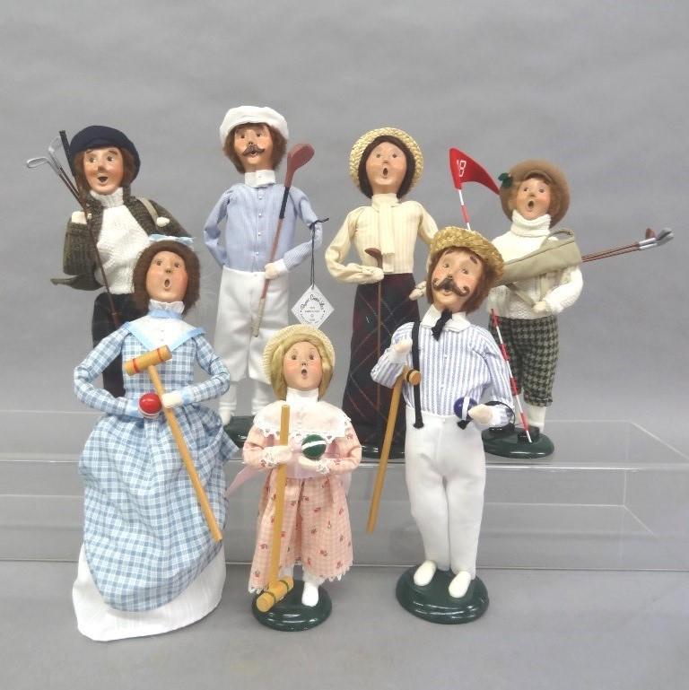 Byers Choice Carolers: Seven Byers Choice Dolls Five Adults, I teen and I child, Walt Disney Male Golfer, Pair of Croquet Players, Girl in Pink Dress with Croquet Stick and ball