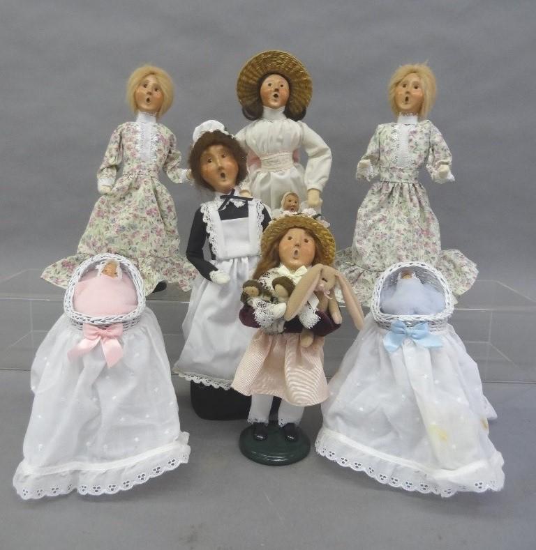 Byers Choice Carolers: Seven Byers Choice Dolls, Woman holding small child, Nanny, Woman in Floral Dresses, Girl with Bunny & dolls, Infant Girl in wicker basinet, Infant boy in white wicker bassinet, baby boy in basket