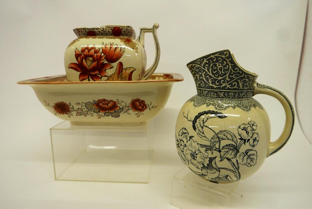 Doulton Burslem Pitchers & Bowl: Antique Doulton Burslem Japanese inspired large pitcher 10.5"H and matching bowl 13.5" by 16.5" by 5"H, also includes and antique Doulton Burslem pitcher with transfer floral decoration 11"H