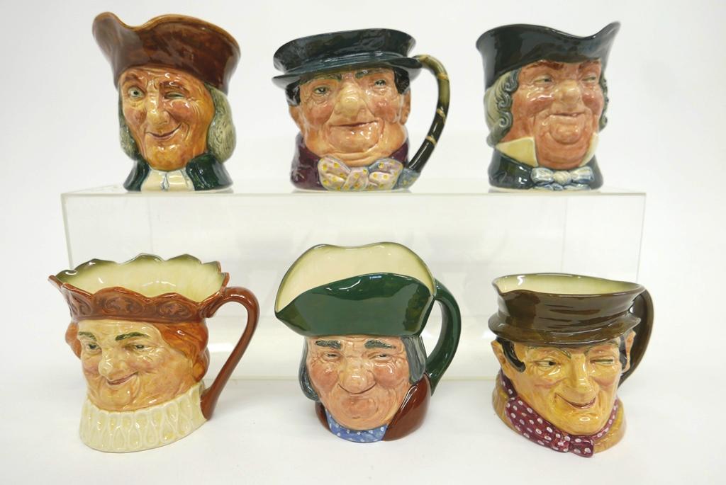 Six Royal Doulton Large Toby Jugs: Six Royal Doulton large Toby jugs ranging from 5.5" to 6.75"H, Tony Weller, Vicar, Sam Weller, Parson, Toby Philpots, Old King Cole