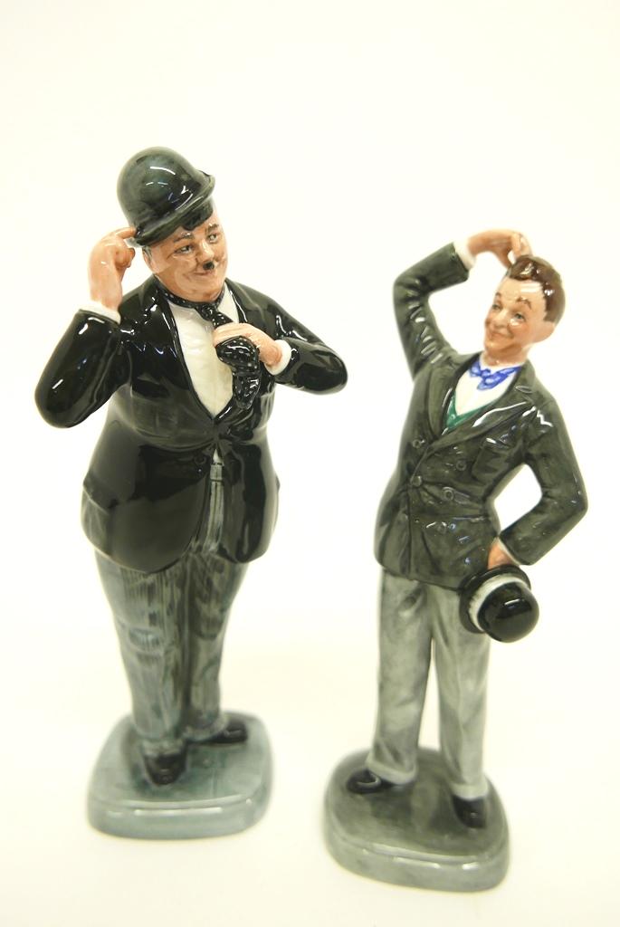 Royal Doulton Laurel & Hardy Figurines: Royal Doulton limited edition porcelain figurines, Stan Laurel number 2211 of 9500 HN2774 9.5"H, Oliver Hardy HN2775 number 2211 of 9500 10"H