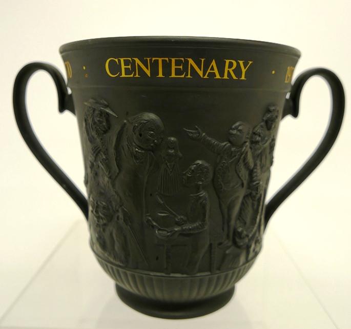 Royal Doulton Dickens Centenary Urn: Royal Doulton black basalt porcelain double handled loving cup or urn celebrating the 100th anniversary of Charles Dickens death, 11.5"W at handles, 8"H