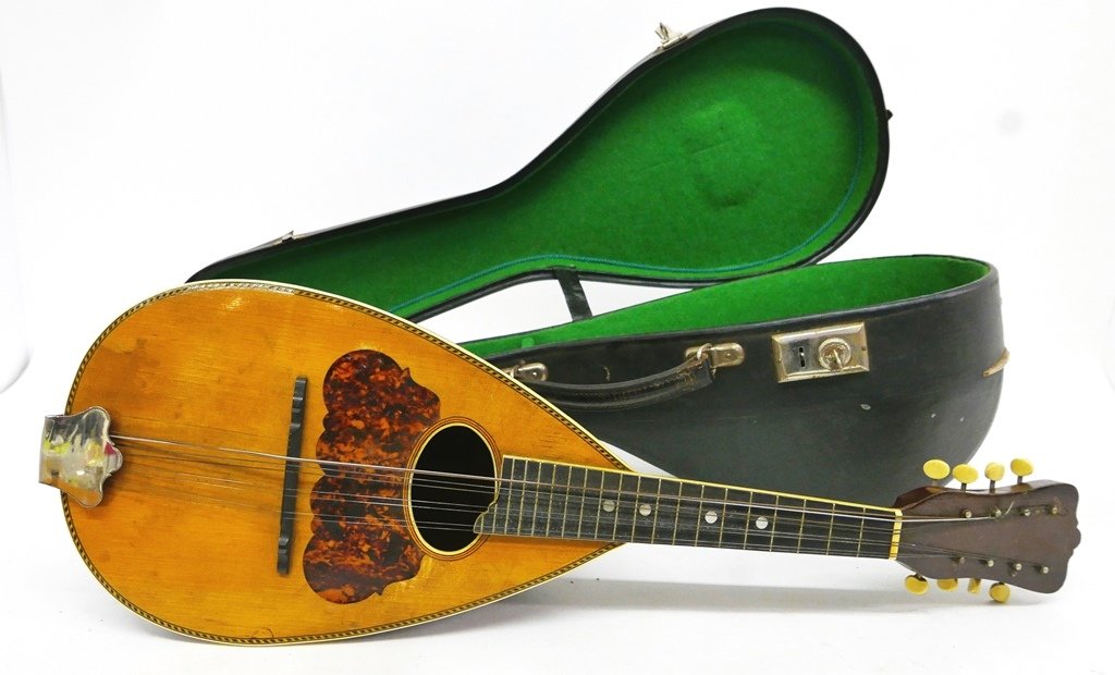 Antique Washburn Bowl back Mandolin & Case: Antique Washburn mandolin serial number 216600, spruce front with twist stringing and faux tortoise guard, rosewood bowl back with inlaid stringing, eight faux ivory keys, 24"L, includes a vintage Ger