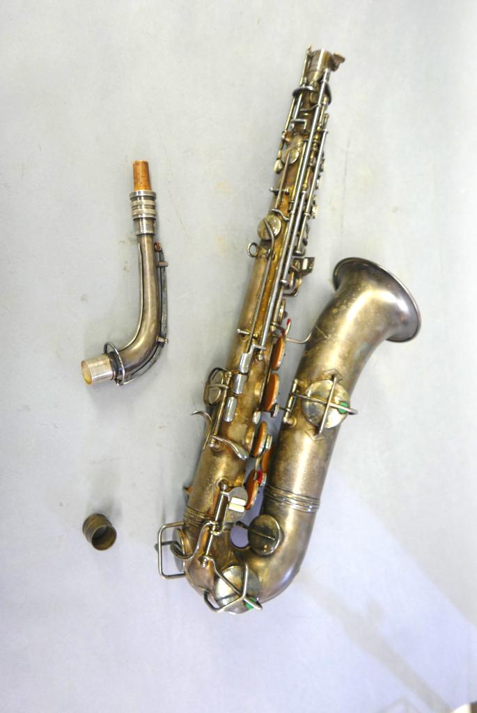 C.G. Conn Saxophone & Case: Antique C.G. Conn silver-plated and engraved saxophone patent 1914, serial number C M202702 L, includes newer Pro Tec padded soft case and straps,