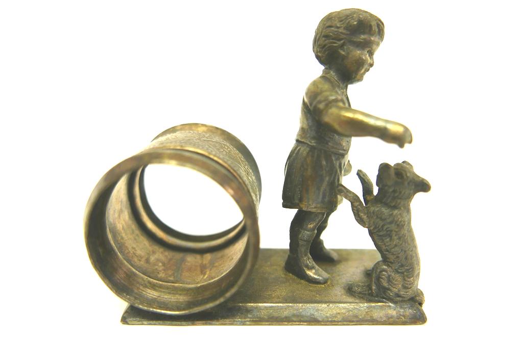 Antique Begging Dog Figural Napkin Ring: Antique Meriden Co. silver-plate Victorian period napkin ring depicting a young girl with a begging dog 3.5"L