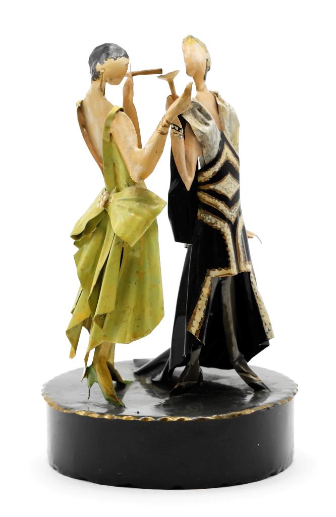 Two Lee Menichetti Artisan Deco Costume Sculptures: Lee Menichetti [New York & Palm Beach Florida - 1931 to 1997] well known mid-century artist known for his theatre related art, these sculptures are made of hand bent and painted sheet brass, single pl
