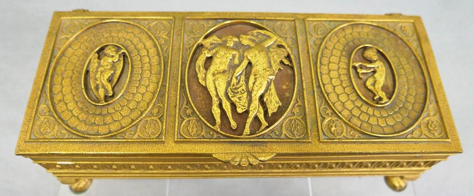 Signed Oscar Bach Humidor: Oscar Bruno Bach [American 1884 - 1957] classical revival humidor in bronze or patinated brass, heavy cast construction, lid with partly draped nudes, claw feet on cabriole legs, signed on bottom, 12.