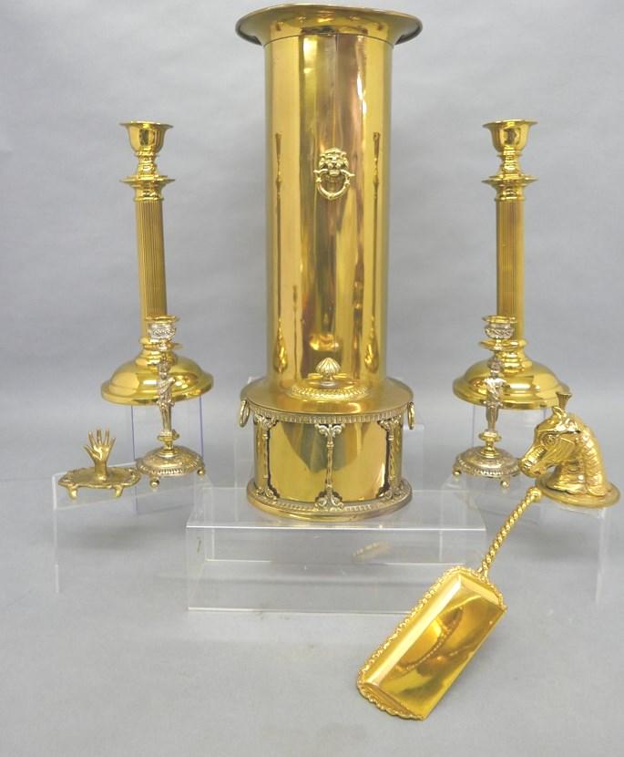 Group of Brass Decorative Accessories: Pair of large fluted candlesticks 15.25"H, pair of figural brass plated candlesticks 8"H, oval brass caddy with hinged lid and ring handles 8"W, ring tray 4"W, antique brass crumber with its silver pl