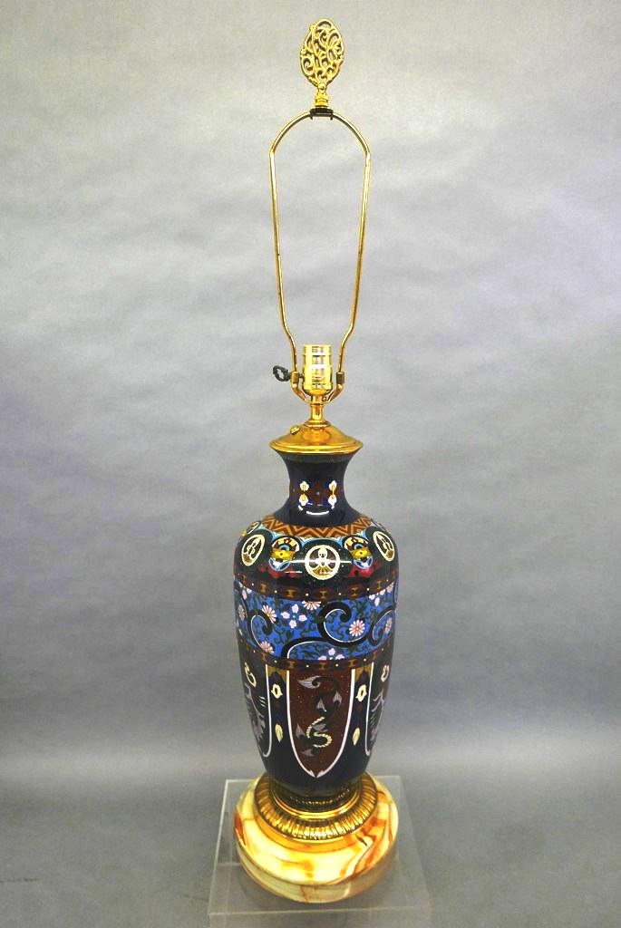 Vintage Large Cloisonne Lamp: Large cloisonne lamp decorated with stylized phoenixes and dragons, floral and geometric patterns, brass plated mounts on a solid marble base, 38"H to top of finial
