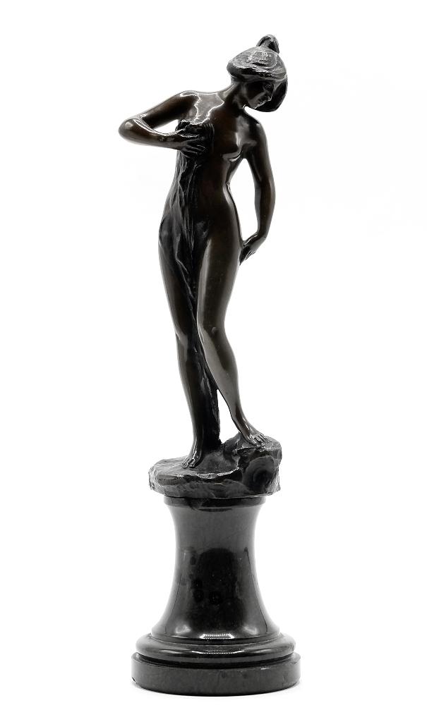 Small Bronze Female Nude statue: Antique bronze statue of a partially draped young maiden, circa 1910 to 1930 mounted onto a turned stone base, unsigned, 10"H overall