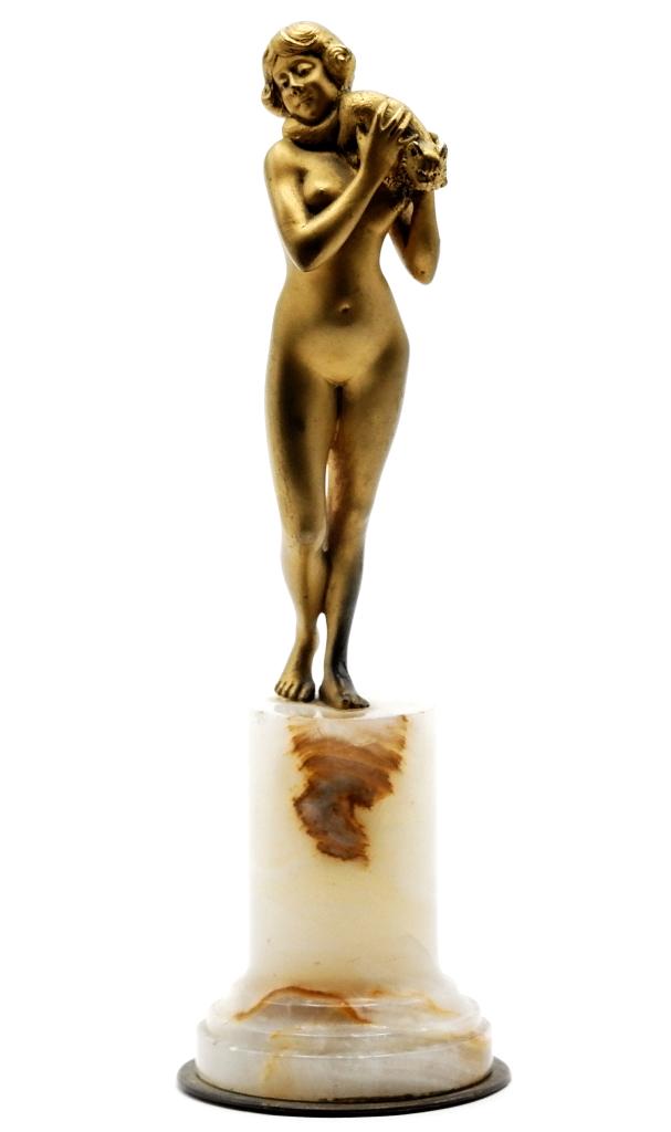 Gilt Bronze Nude With Cat: Antique Art Deco statue circa 1920 to 1940, continental gilt bronze statue of a nude holding a cat mounted on an onyx base, not signed, foot stamped 5764, bronze plate on bottom of base stamped FRANCE