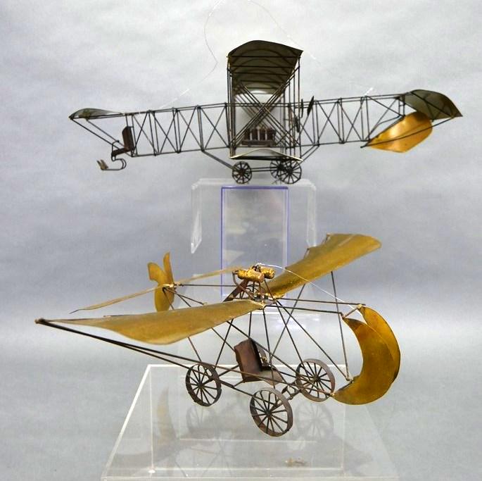 Pair Of Whimsical Copper Airplanes: Pair of decorative copper and steel airplanes, 23"L by 16"W and 14"L by 18"W