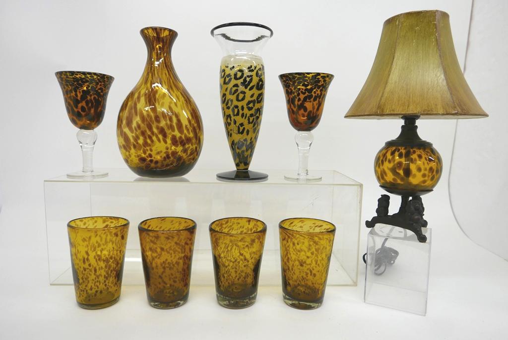 Kosta Boda Leopard Vase & Others: Signed Kosta Boda Belgian art glass leopard vase 11.5"H, unsigned hand blown leopard spot decanter with polished pontil 11.25"H, with four matching heavy glass tumblers 5.75"H, also includes a pair of