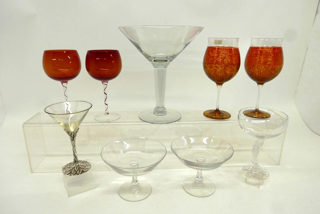 Val St. Lambert & Horchow Glassware: Pair of Italian Horchow large wineglasses 9"H, pair of Val St. Lambert signed compotes 6.25"W, 4.75"H, pair of unsigned red wineglasses with clear and red twist stems 7.75"H, champagne glass with etch