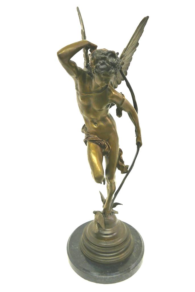 Bronze Cupid Statue After Jules Coutan: Bronze statue of Cupid holding a bow and a quiver of arrows mounted onto a black marble base, signed J. Coutan P, after the original by Jules Felix Coutan [France 1848-1939], 27.25"H