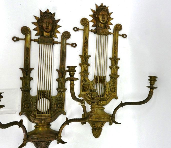 Pair Of Large Bronzed Empire Sconces: Pair of vintage French Empire style patinated brass lyre form sconces with twin arms and sun god finial, these were electrified and are now lacking all wiring and sockets, 19.5"W, 31.5"H, 8.5"D