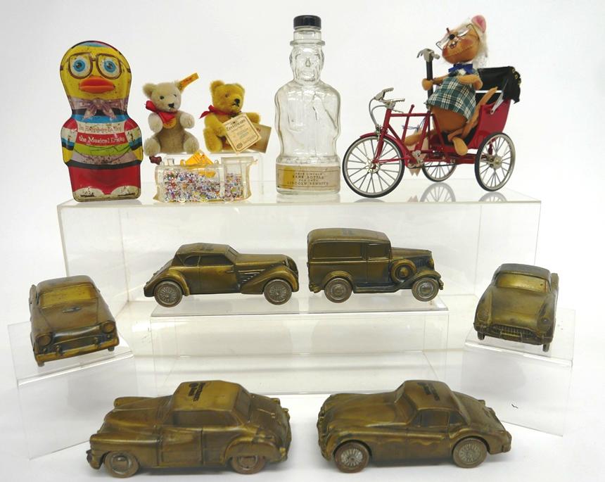 Vintage Coin Banks & Other Toys: six Banthrico cast metal car banks circa 1970's includes, Jaguar, Chrysler Town & Country, Ford van, Corvette, Thunderbird and Cord, Lincoln Bank bottle with original label 9"H, locomotive candy conta