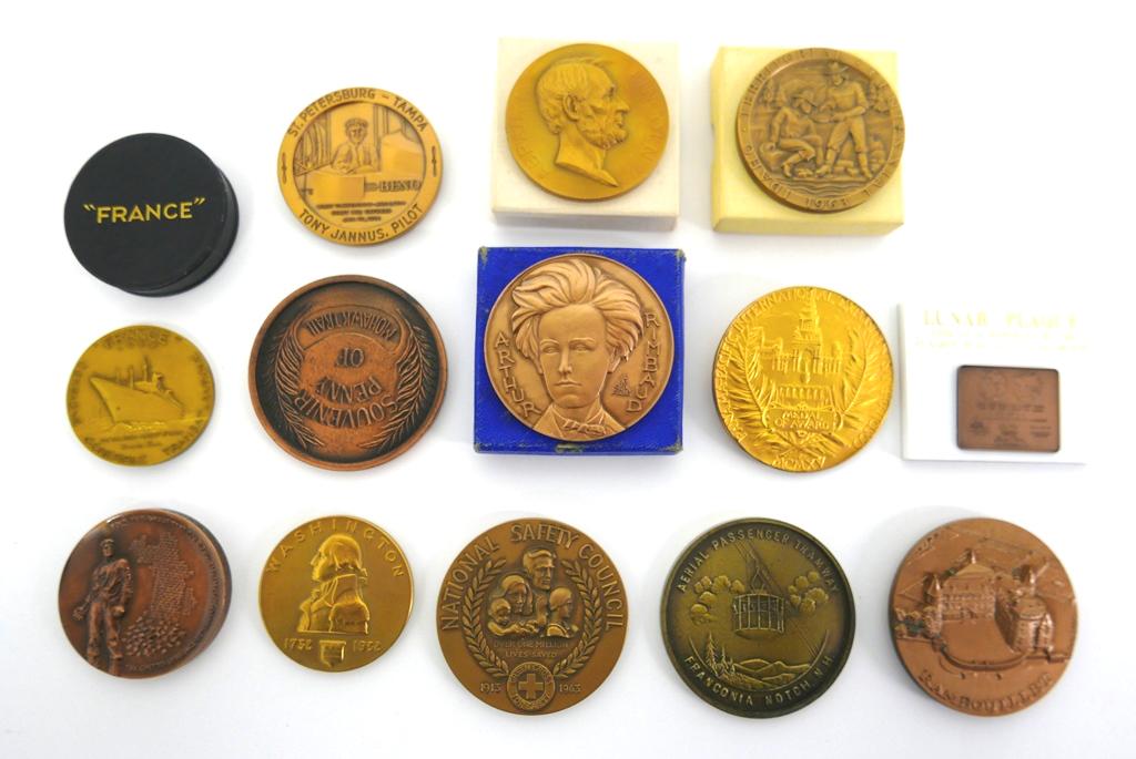 Collection of Vintage Desk Medals: Thirteen assorted commemorative desk metals, most of brass or bronze, French Line "France" 1962 medal in case, Mohawk Trail Good Luck Coin, Idaho Territorial Centennial 1963 in box, Abraham Lincoln 19