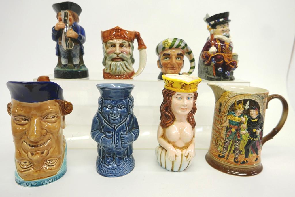 Seven Character Toby Jugs & Pitcher: Buxom mermaid Toby jug with English style crown mark 8.75"H, king jug with blue crown mark, Hamlet pitcher 8"H marked England, Beefeater jug, small Lego pirate jug, Shorter England blue glazed jug, un