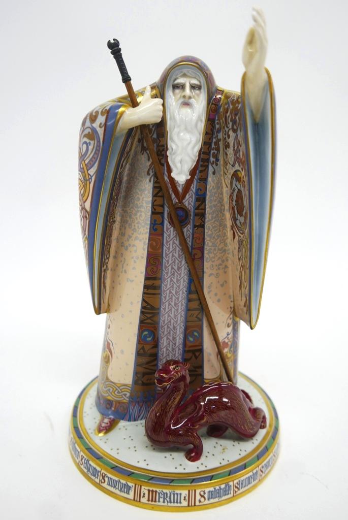 Minton Arthurian Legend Large Merlin Figurine LE: Minton large porcelain figure of "Merlin The Great Enchanter" with a baby dragon at his feet from The Arthurian Legend series, limited edition number 72 of 250, includes original COA, 13"H to top of s
