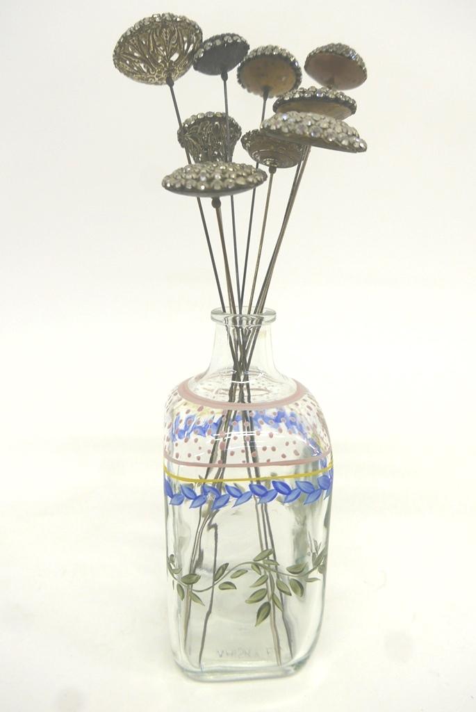 Nine Antique Paste Hat Pins: Group of nine antique glass paste decorated hat pins, longest 12.75, largest 1.75"D