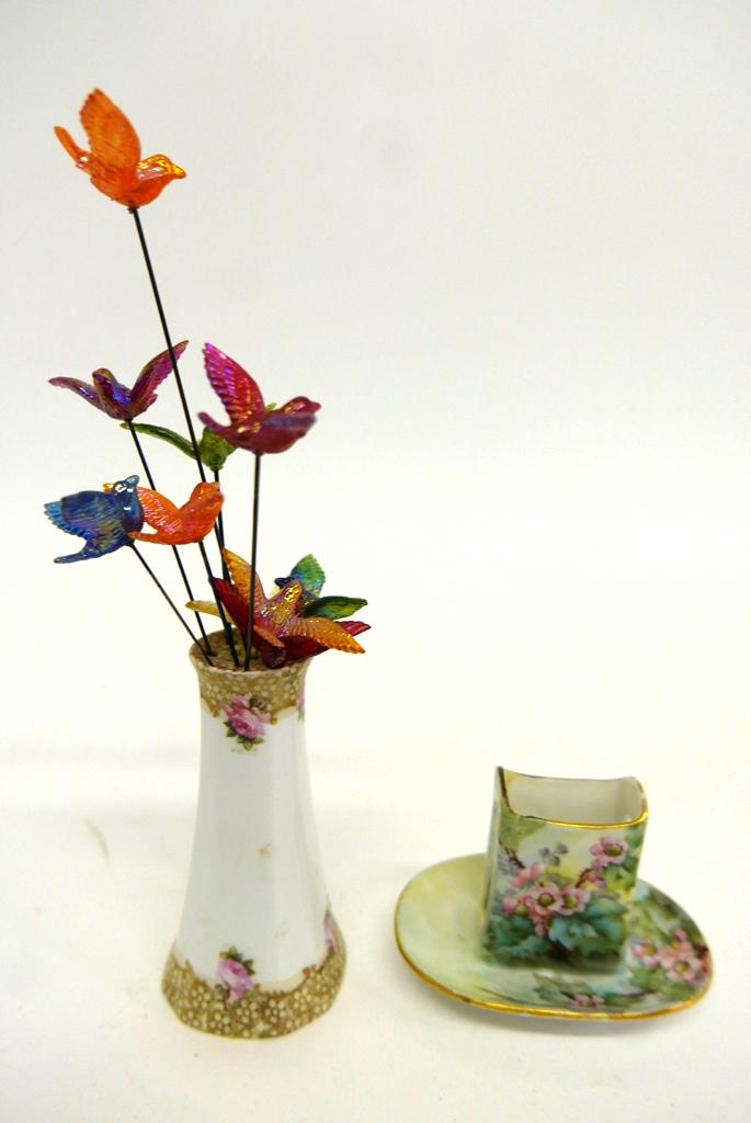 Ten Antique Bird Hat Pins & stand: Group of ten antique plastic bird pins in assorted colors, about 2"W, longest 10.25"H, German hand painted hat pin stand 5"H with glaze crazing, Limoges French porcelain match holder