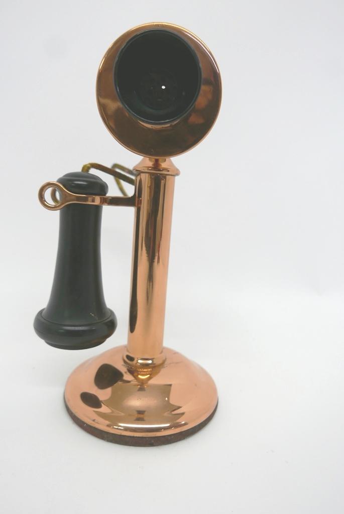 Antique Brass Candlestick Phone: Antique polished brass candlestick phone with hard rubber ear piece, marked Western Electric Pat. Jan 26 15, 11.5"H