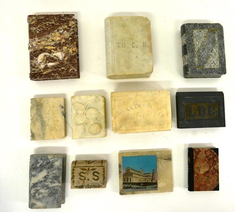 Carved Stone Books & Doorstoppers: Nice selection of vintage to antique carved stone books, white marble book engraved TO E.B. Holy Bible 5.5"H with corner chips, white marble book engraved Richard Clark Bible 5.25"H with corner chips,