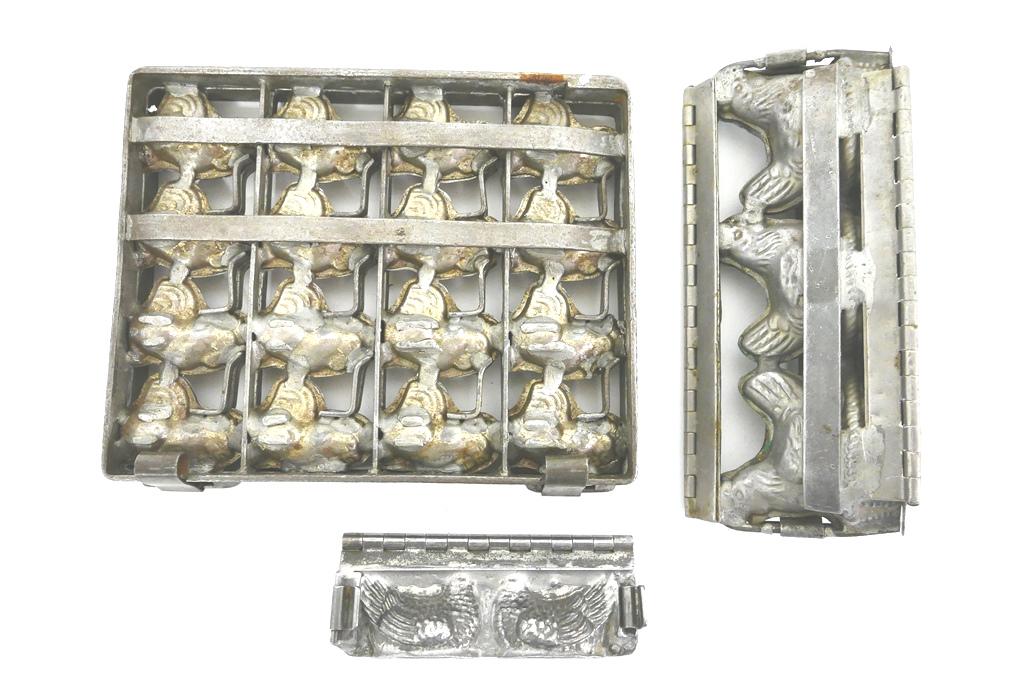 Three Chicken & Rooster Chocolate Molds: Three antique plated steel chicken molds, mold for sixteen roosters 8" by 10"mold for three hens on nest 9"W, mold for 2 hens on nest 5.5"W