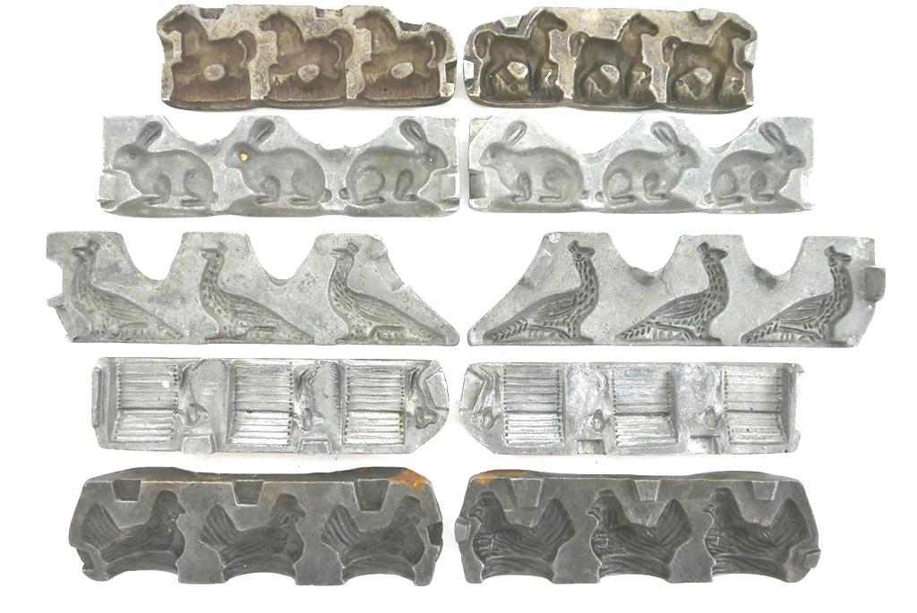 5 Antique Lead Animal Toy Molds: Five antique two part lead and iron two part molds for casting lead toys, includes a combined 3 dogs peeking out of doghouse, 3 hens on nest, 3 peacocks, 3 rabbits and 3 horses, longest mold 7"L