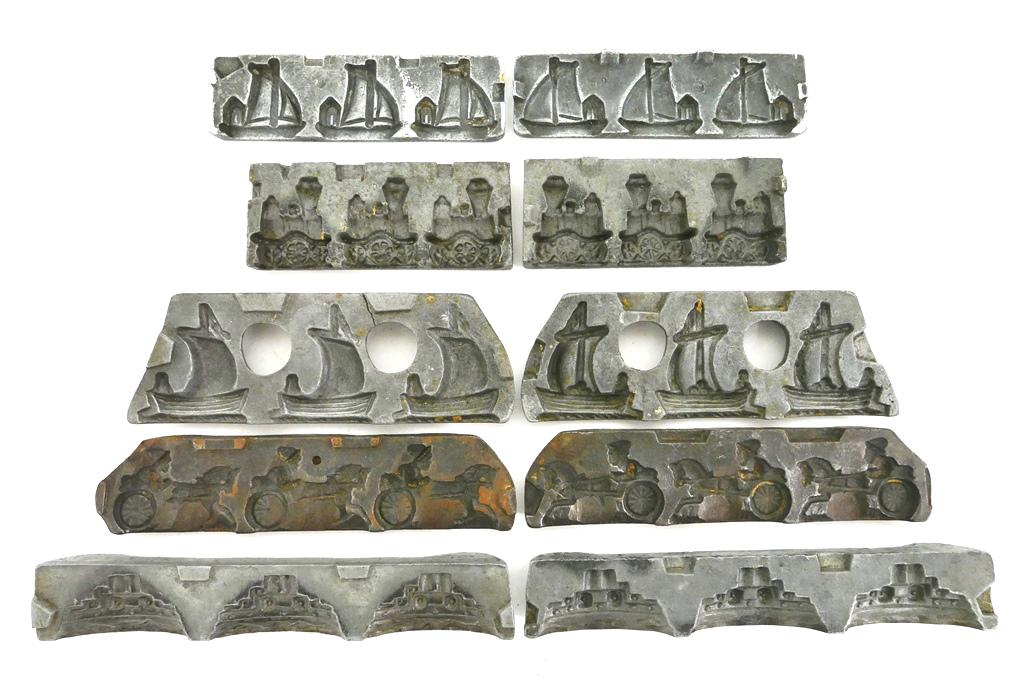 5 Antique Lead Transportation Toy Molds: Five antique two part lead and iron molds for casting lead toys, includes a combined 3 horse pulled carts, 3 locomotives, 3 large sailboats, 3 battleships and 3 small sailboats, largest mold 9.5"L